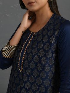 A gold hand block printed chanderi kurta in indigo with gota details in placket and cuff. The piece comes with a matching slip in mul and pants with elasticated - draw string adjustable waist band Kurta measurements (in Inches): Size S: Bust - 39", Waist - 38" Size M: Bust - 42", Waist - 41" Size L: Bust - 45", Waist - 44" Length: 47", Sleeve length: 17" Pant Measurements (in Inches): Size S: Waist - 30-32" Size M: Waist - 33-35" Size L: Waist - 36-38" Length: 35" Fabric: Chanderi (Cotton silk) Kurta Designs Women, Kurta Designs, Gold Hands, Box Pleats, Cotton Pants, Cotton Silk, Block Print, Aesthetic Clothes, Pants Set