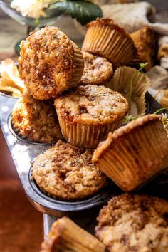 muffins are stacked on top of each other and ready to be eaten in the oven