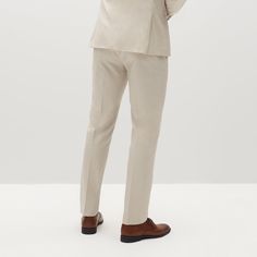 Embody laid-back elegance in the light tan suit pants. This mod, sandy shade with visible woven texture on these tan slacks is designed to suit you from sunny celebrations to the office, candlelit dinners, and everywhere in between. The men’s tan dress pants are crafted from signature Eco Stretch fabric, sure to keep you cool and comfortable through it all. Pair with the matching Men’s Tan Suit Jacket in the perfect light beige color for a clean look in a 2-piece suit, or style these suit pants Light Tan Suit, Groomsman Suits, Tan Suit Jacket, Sand Dress, Tan Dress Pants, Dress Pants Mens, Tan Suit, Tan Dress, Wedding Groomsmen