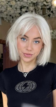 platinum blonde, winter hair colour, icy blonde, platinum blonde hair color Icy Blonde Curtain Bangs, Platinum Lob With Bangs, Short Platinum Blonde Hair Brown Eyes, White Blonde Bob With Fringe, Curtain Bangs White Hair, Medium Icy Blonde Hair, Cool Tone Platinum Blonde, Icy Platinum Hair, Icy Blonde Bob With Bangs