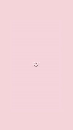 a pink wall with a heart drawn on it's side in the center and an arrow at the bottom