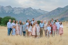 a large group of people standing in a field