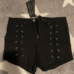 Women’s Black High Waist Lace Up Shorts With Minor Imperfection On Back (See Photo) Nwt Size Medium Fits More Like A Small Edgy High-waisted Black Shorts, Edgy Black Mid-rise Shorts, Gothic Black Short-length Bottoms, Edgy Black High-waist Jean Shorts, Lace Up Shorts, Black High-waisted Shorts With Button Closure, Womens Black Shorts, Black High Waist, Y2k Style