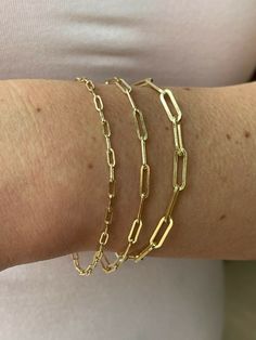 "Super trendy and stylish handmade sterling silver paperclip bracelets 2.5mm, 3mm & 4mm Solid 925 sterling silver with 14k yellow gold finish Stamped \"925\" & \"Italy\" We have in 6-8\" Here is weights for 7\"...if your bracelet is longer or shorter weight will vary slightly 2.5mm- 2g 3mm- 2.7g 4mm- 4.8g Ships fast We also sell matching chains Let us know if any questions" Elegant Handmade Paperclip Bracelet As Gift, Classic Handmade Chain Bracelet For Everyday, Classic Gold Paperclip Bracelet In Sterling Silver, Elegant Hypoallergenic Paperclip Bracelet, Gold Sterling Silver Paperclip Bracelet For Everyday, Gold Sterling Silver Paperclip Bracelet Gift, Classic Gold Sterling Silver Paperclip Bracelet, Handmade Paperclip Jewelry For Everyday, Everyday Gold Sterling Silver Paperclip Bracelet