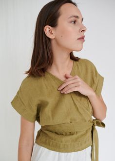 "SIZING & FIT This garment is true to size, and we recommend choosing the size you usually wear. If you want the garment to be loose-fitting, choose a larger size than you usually wear. Before placing an order, check the approximate measurements of the finished garment given below. Model is 5′6″ (170cm) tall with an 80cm/31″ bust, 68cm/26″ waist, 91cm/35″ hip, and she is wearing an XS in olive. XS Length ± 50cm | 19.7\" Bust ± 96cm | 37.8\" Sleeve length from neckline ± 23cm | 9.1\" Sleeve w Kimono Wrap Top, Linen Wrap Top, Olive Top, Kimono Wrap, Cotton Tunic, Wrinkle Remover, Linen Top, Etsy Fashion, Wrap Top