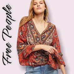 New With Tags Free People Wrap Blouse With Bell Sleeves Very Chic, Gorgeous And Boho Style You Can Dress Up Or Down. Great For Travel, Vacation. Stunning Colors And Print Great For Photography, Social Media. Measurements Are Approximate All Actual Photos Fall Vacation Top With Paisley Print, Fall Vacation Tops With Paisley Print, Summer Red Blouse With Paisley Print, Red Bohemian Tops With Paisley Print, Trendy Boho Print Tops For Festivals, Red Bohemian Paisley Print Tops, Red Bohemian Blouse With Paisley Print, Red V-neck Blouse With Paisley Print, Red Boho Print V-neck Top