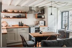 the kitchen is clean and ready to be used as a dining room or living room