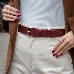 We've put a New York spin on western style. Reveal a little bit of your wild side with this premium leather belt, finished with a hair tip. Now the question is will you go monochromatic or for a pop of color? • Burgundy belt with burgundy hair tip• 1.25" (3.5 cm)• 100% cowhide premium leather, made in Spain.• Bushwick nickel free buckle Burgundy Belt Outfit, Red Belt Outfit Ideas, Fall Belts, Red Belt Outfit, Belt Styling, Belts Aesthetic, Burgundy Accessories, Black Hair Tips, Elegant Belt