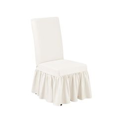 a white chair with a ruffled skirt on the back and seat cover over it