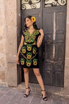 -This Beautiful Mexican Floral Dress has a unique design from Puebla, Mexico. It is the perfect dress for a fun night out or a special event.  -It's made out of cotton, is full of colorful embroidered details and has some crocheted details. -It has ties on the back for an adjustable fit. The earrings you cay buy too and find here https://www.etsy.com/es/listing/637147293/filigrana-redonda-filigrana-clasica?ref=shop_home_active_1&pro=1&frs=1 More styles here: https://www.etsy.com/es/shop/SoleiEthnic?ref=seller-platform-mcnav&section_id=25367133 Casual Fitted Dress With Sunflower Print, Casual Fitted Sunflower Print Dress, Yellow Embroidered Fitted Dress, Fitted Embroidered Sundress, Yellow Embroidered V-neck Dress, Fitted Yellow Dress With Floral Embroidery, Mexican Kimono, Traditional Mexican Dress, Grad Outfits