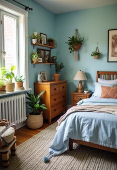 Light Blue Boho Bedroom Blue Room Green Accents, Light Blue Small Bedroom, Light Blue Bed Frame Bedroom Ideas, Modern Coastal Bedroom Ideas Blue, Aesthetic Blue Bedroom Ideas, Greenish Blue Bedroom, Light Blue Bedroom Paint Colors, Light Blue And Brown Bedroom, Blue Cottagecore Bedroom