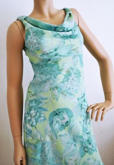 Teal, Blue , green, Green Dress, Summer ,Gown Size 5,6, dress Pretty light green and blue floral dress Dress size 5/6 Bust: 32'' Waist: 30'' Hips: 32'' Length from back of neck to bottom: 34'' 100% polyester Great condition- clean, no wear or marks Free shipping in the US NK571T Teal, Blue , green, Green Dress, Summer ,Gown Size 5,6, dress Fitted Sleeveless Light Green Dress, Fitted Light Green Sleeveless Dress, Light Green Fitted Sleeveless Dress, Green A-line Floral Dress For Summer, Green A-line Floral Dress For Garden Party, Green Lined Fitted Maxi Dress, Summer Fitted Light Green Maxi Dress, Fitted Light Green Maxi Dress For Summer, Green Sleeveless Lined Maxi Dress