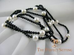 Black Spinel Pearl Necklace featuring 18 beautiful high quality 9mm white cultured freshwater pearls set amongst diamond cut spinel. Necklace shown is customized to be worn as a single, double or triple strand. 14K round ball clasp. 36” Hand made in NYC. Customization of different lengths and pearls available. 2-3 weeks delivery. Spinel Necklace, Cultured Pearl Necklace, Pearl Set, Black Spinel, Freshwater Cultured Pearls, Cultured Pearls, Diamond Cut, 3 Weeks, Freshwater Pearls