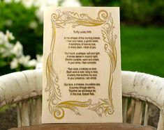 a card with a poem on it sitting on a chair