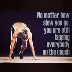 a woman doing a handstand in front of a black background with the words, no matter how slow you go, you are still lapping everybody on the couch