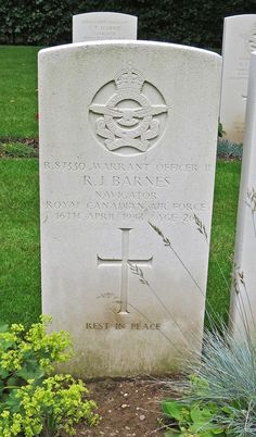 the headstones of two men and one woman are shown in front of green grass