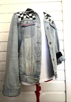 Repurposed denim jacket with authentic 1980's fabric detailing. Neck: 17 in Chest: 15 1/2 in Across Back: 16 in Shoulders: 5 in Sleeves: 25 in Cuffs: 11 1/2 in Front Length (shoulder to bottom): 24 in Back Length (Neck to bottom): 23 1/2 in Arms eye: 20 in Retro Winter Denim Jacket With Patchwork, Retro Patchwork Denim Jacket For Winter, Retro Distressed Outerwear For Spring, Retro Patchwork Denim Jacket For Fall, Retro Spring Denim Jacket With Patches, Spring Retro Denim Jacket With Patches, Retro Cotton Denim Jacket For Spring, Retro Distressed Denim Jacket For Spring, Reworked Denim Jacket For Fall Streetwear