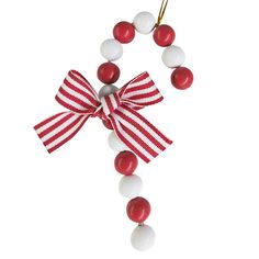 a red and white beaded necklace with a bow