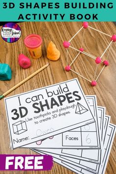 the 3d shapes building activity book is shown on a wooden table with markers and pencils