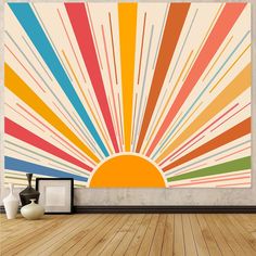 the sun is shining brightly in an empty room with wood flooring and large wall art