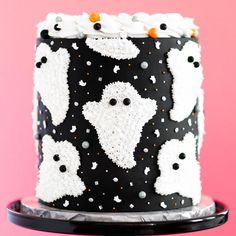 a black and white halloween cake with sprinkles