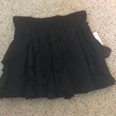 Nwt Free People Mink Skirt Black Mini Skirt For Beach In Spring, Black Skirt With Elastic Waistband For Beach, Black Flowy Skort With Elastic Waistband, Chic Black Mini Skirt For Beach, Chic Black Mini Skirt For The Beach, Chic Black Beach Mini Skirt, Casual Black Ruffled Skirt, Black Skort For Beach, Short Black Beach Skirt