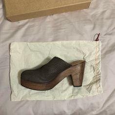 Never Worn Before Women's Trask Shoes. Comes In Original Shoe Box With Shoe Bag. Brown Heels With Rubber Sole For Spring, Spring Brown Clogs With Textured Sole, Chic Brown Almond Toe Clogs, Brown Slip-on Mules With Textured Sole, Brown Textured Sole Slip-on Mules, Chic Brown Mules With Rubber Sole, Casual Brown Mules With Textured Sole, Brown Almond Toe Sandals With Textured Sole, Chic Leather Clogs Medium Width