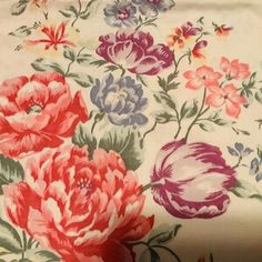 an image of a flowered tablecloth with flowers on the top and bottom half