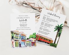 two wedding programs are sitting next to each other on a white surface with palm trees and buildings in the background