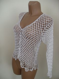 Small silk vest, hooked with white pearls rand 8-10 USA Elegant Fitted V-neck Crochet Top, Elegant Summer Beach Vest, Elegant White Party Vest, Elegant White V-neck Crochet Top, Elegant Summer Crochet Top, Elegant Stretch Summer Vest, Elegant Fitted Crochet Top With V-neck, White Fitted Bohemian Vest, Fitted V-neck Crochet Vest Top