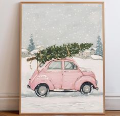 a pink car with a christmas tree on top