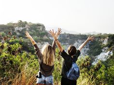 two women with their hands up in the air and text that reads, friends is about who came and never left your side