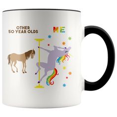 a white and black coffee mug with an image of two horses on the same side