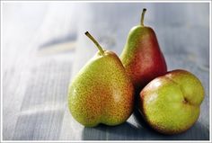 three pears sitting on top of each other