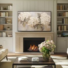 a living room filled with furniture and a fire place