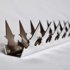 several metal crowns sitting on top of each other