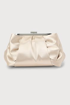 Elegant Plus OneThis glossy satin clutch is ready to RSVP in style with its flexible exterior, complete with a folded bow-like detail that lends an ultra-chic aesthetic. Open the silver top clasp closure to reveal a lined interior for your most precious essentials. Detachable silver chain strap. Lined. Bag Measures 8. 5" Wide, 6. 5" Tall, And 2" Deep (Relaxed). 47. 5" Detachable Chain Strap. Strap Has A Drop Measurement Of 23. 5". Shell: 100% Polyester. Imported. Lulus | Something Special Champa Champagne Clutch, Satin Clutch, Silver Top, Chic Aesthetic, Lulu Fashion, Box Clutch, Silver Tops, Personal Marketing, Something Special