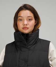 This wonderfully warm down vest has a cinchable hem that lets you customize the shape and keep out cold drafts. Designed for Casual. Relaxed fit feels roomy and can be worn over larger layers. Size down if you prefer a slimmer fit. Removable hood. Cinchable hem. Zippered hand pockets with a hidden phone sleeve. Interior pockets hold the essentials. Keep Out, Warm Down, Vest Designs, Cropped Vest, Loungewear Women, Lululemon Women, Back Women, Down Vest, Women's Coats & Jackets