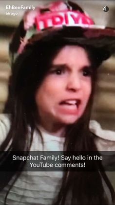 a woman wearing a hat with the words snapchat family say hello in the youtubee comments