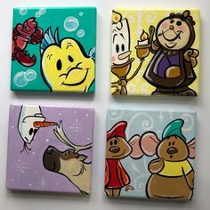 four square coasters with cartoon characters painted on them