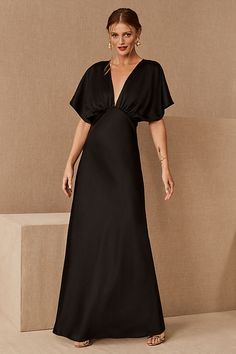 Timelessly elegant, this satin maxi dress pairs a gracefully draped bodice with soft sleeves and a flowy skirt. A daring plunge neckline completes the look.Only available at BHLDN Formal Dresses With Draped Flutter Sleeves, Formal Dresses With Draped And Flutter Sleeves, Elegant Evening Maxi Dress With Flutter Sleeves, Silk Evening Dress With Flutter Sleeves, Elegant Evening Dress With Flutter Sleeves, Elegant Butterfly Sleeve Maxi Dress For Party, Chic Flutter Sleeve Maxi Dress For Evening, Elegant Maxi Dress With Butterfly Sleeves For Party, Elegant Flutter Sleeve Maxi Dress For Wedding