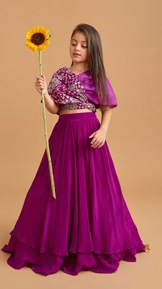 Stylish Overlap Purple Top And Layered Lehenga Overlapping Dress Pattern, Saree Dress For Girls Kids, Lehenga For Kids Designer, Kids Lehnga Dress Design, Kids Lehanga Blouses Designs, Kids Dress Patterns Indian, Baby Lehnga Design, Kids Chaniya Choli Designs, Kids Indian Wear Designer