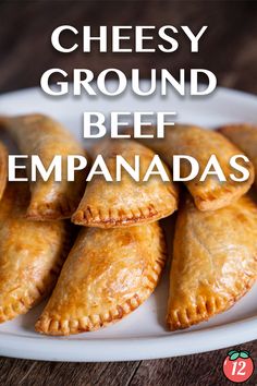 cheesey ground beef empanadas on a white plate with text overlay reading cheesy ground beef empanadas