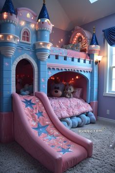 a bed with a slide in the middle of it and a stuffed animal on top