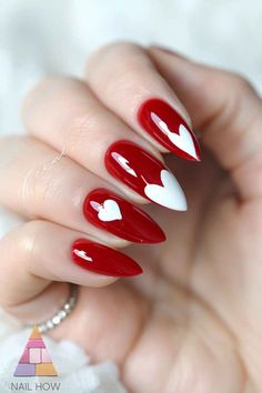 Show off your love with these red nails adorned with white heart accents. Perfect for a cute and romantic fall style. Check out more adorable nail designs at NailHow.com and save this pin! Blue Nail Polish