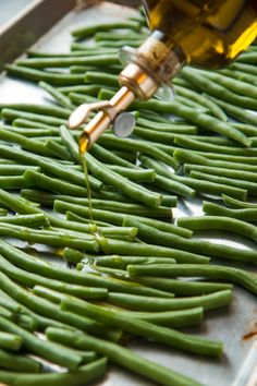 green beans being prepared to be cooked with oil