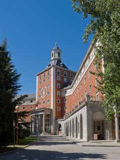 an old building with a clock tower on top