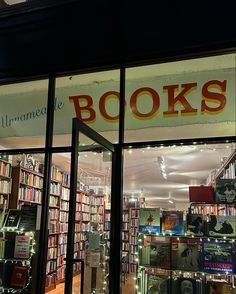 the front window of a book store at night