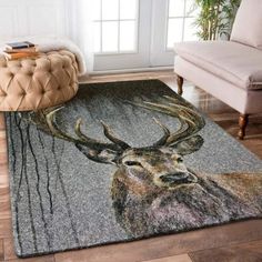 a rug with an image of a deer's head on it in a living room