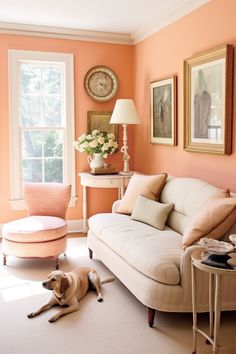 a living room filled with furniture and a dog laying on the floor next to it